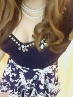 西口 麻央
